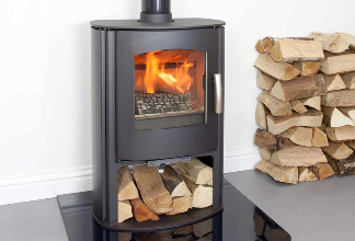 Freestanding Timber Stove with a Logstore underneath, and logs piled-up along the side wall